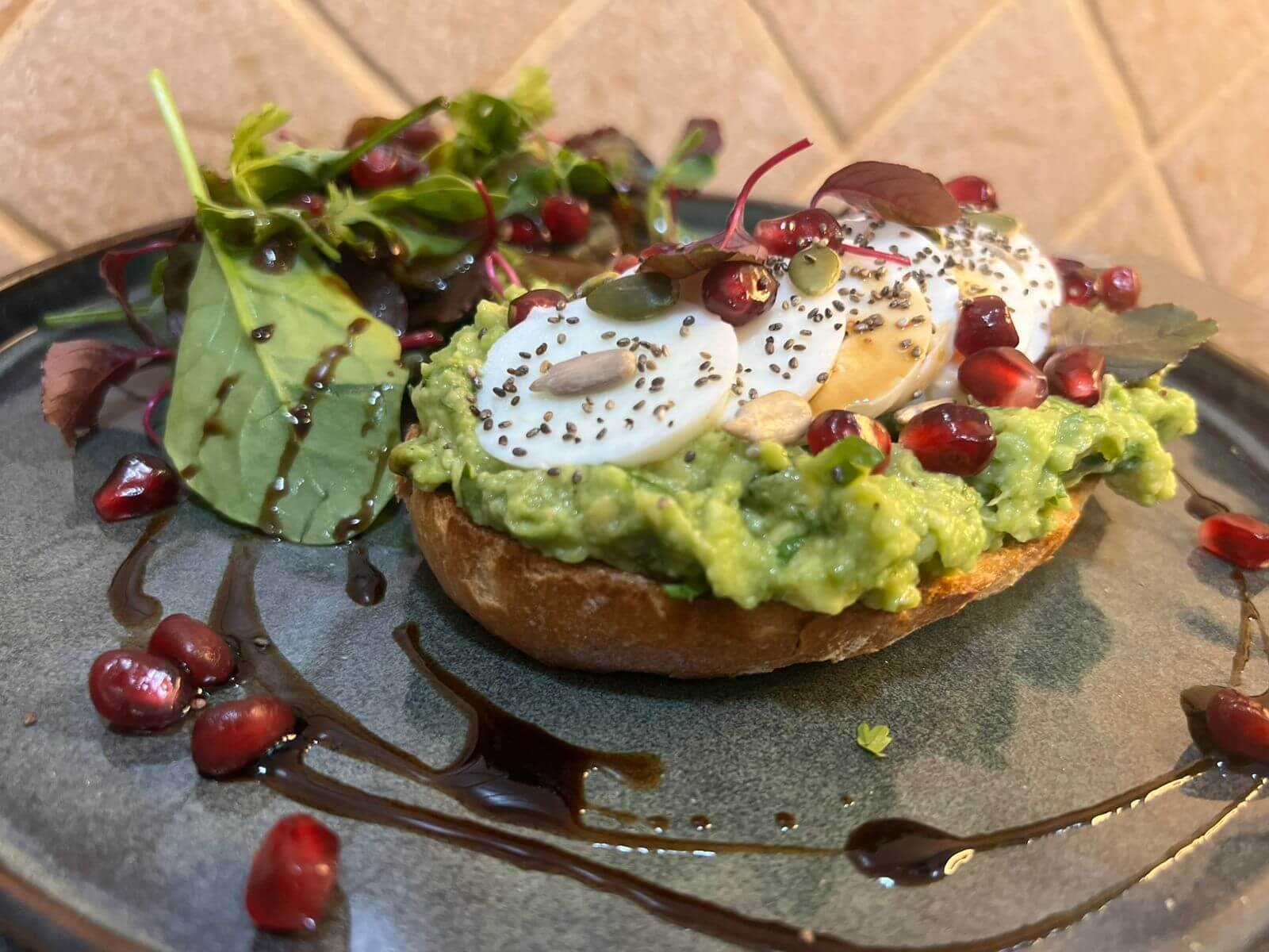avocado and egg bruschetta in a plate