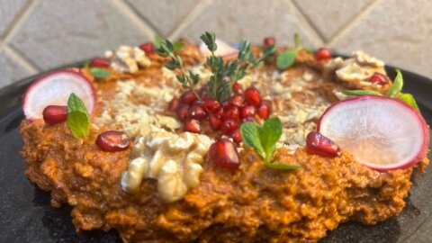 Close-up of easy Muhammara dip made with roasted red peppers, walnuts, and olive oil