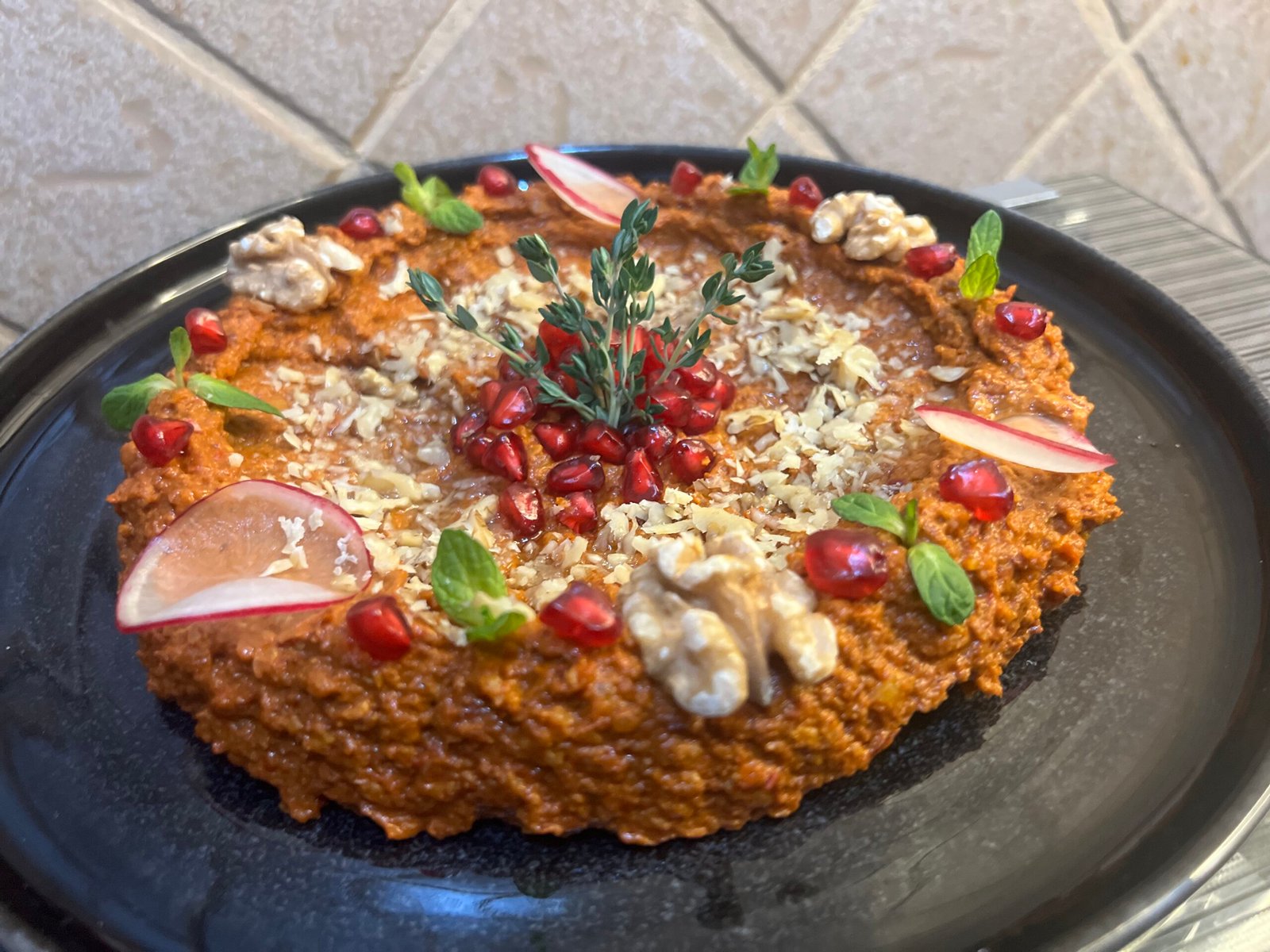 easy muhammara plate decorated with veggies