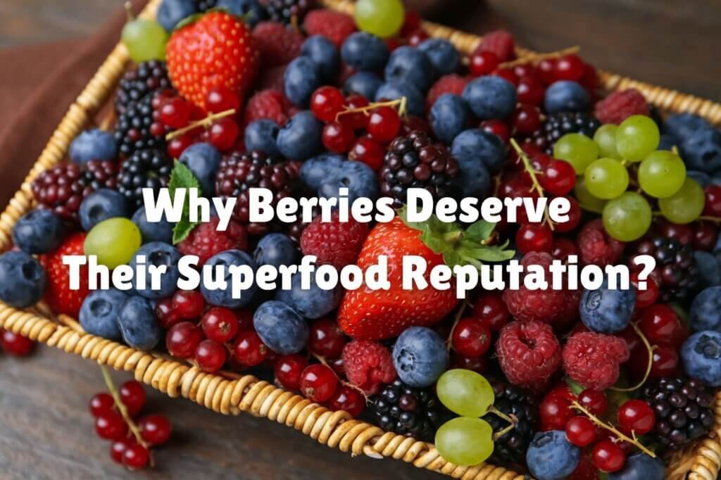 Basket filled with fresh strawberries, blueberries, raspberries, blackberries, red currants, and grapes illustrating the nutritional benefits of berries
