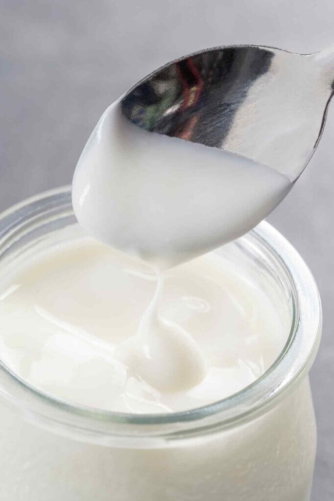 Plain yogurt used to tenderize chicken in a traditional chicken tawook marinade
