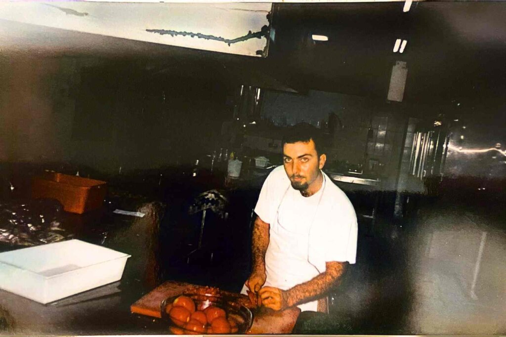 Young François dicing tomatoes as a commis chef in the kitchen of Casino Piscine Aley