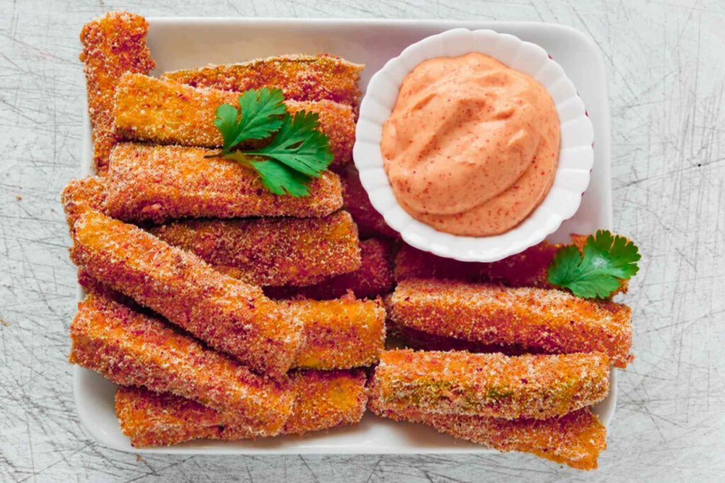 Crispy mozzarella sticks served with creamy homemade cocktail sauce