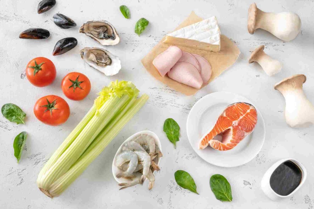 How to season foods with Umami-rich foods including tomatoes, mushrooms, seafood, salmon, cheese, cured meat, and soy sauce.